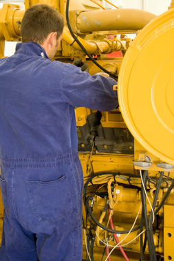 Engineer performing maintenance of equipment